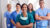 nurses standing next to each other smiling