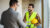 construction man shaking hands with business man