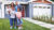 Family standing in front of a beautiful home